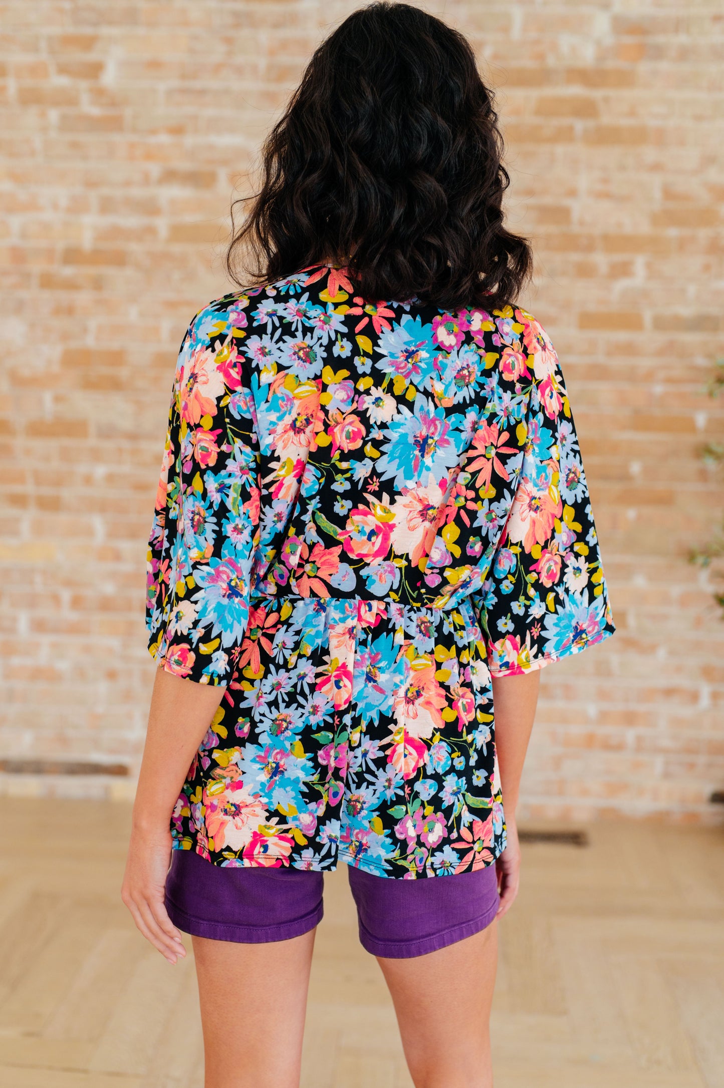 Dreamer Peplum Top in Black Multi Floral
